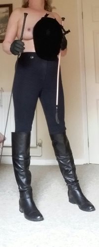 Trying on my equestrian gear for size including crop and whip...yep it fits...