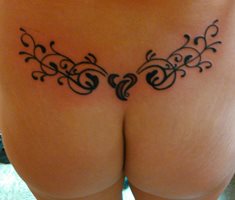 The new tattoo.  Is it a " Tramp Stamp" or a " Cum Target"...you decide.&#1...