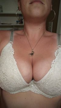 Girlfriends breast as she's undressing. What do you think?  Pm's and Commen...
