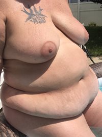 Sitting on my fat ass outside in the pool. Everything else is resting on me...