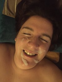 Smiling with a load on her face. Please comment or leave requests