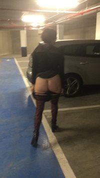 stripping her thong off while leaving the store
