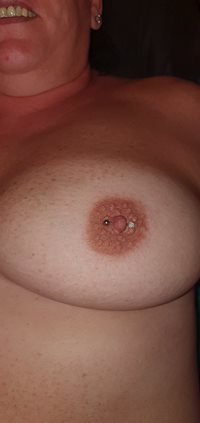 Friend came round and pierced her nipple for her