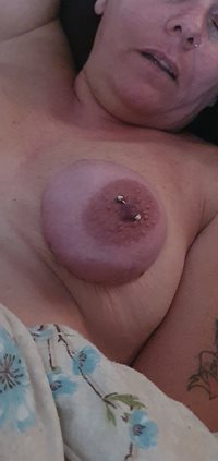 Banded up her saggy tit