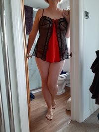 The wife trying on one of her new pressies