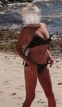 I love to be watched on the beach in a bikini