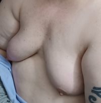 Tracey showing off her saggy tits on 11-18-23