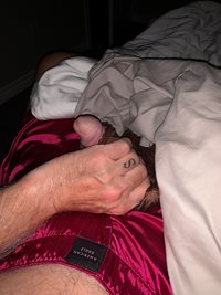Laying in bed next to my sleeping wife…wearing silk boxers and stroking my ...