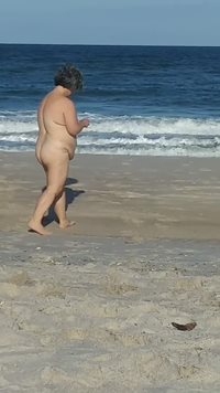 Sexy BBW strolling  on  beach