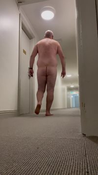 Nude hotel corridor walk