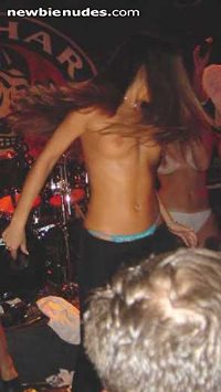 Dancing topless...  I am not in compotition with anyone. I post for your pl...