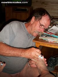 lknag74 painting my toe nails. this is one thing that turns a girl on....