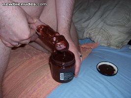 Hubby smearing chocolate on his cock