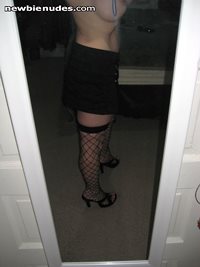Slut Wife looking at herself in mirror and taking pics saying, "mirror mirr...