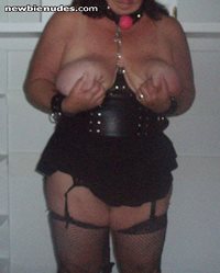 Submissive slut has to show off her tits.