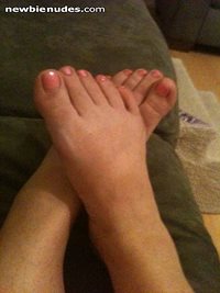My wifey's feet, after I got to paint her toenails!