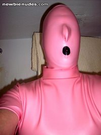Pretty in Pink! Hooded in latex... hard to breathe in this one... can't see...