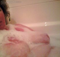 bathing her amazing breasts