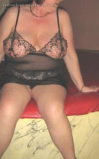Same orgy room, this time in a lace top with cut outs to expose my nipples