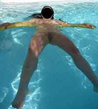 My wife in the pool naked