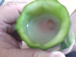 Fucking a hollowed out cucumber