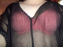 Sheer Black Top and Peach Coloured Bra