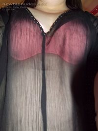 Sheer Black Top and Peach Coloured Bra