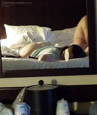 Wife with her pants down waiting to be given a hiding in the hotel room. Ho...