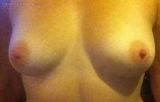 WOW I JUST LOVE THIS PHOTO OF MY WIFES TITS   WHAT WOULD DO WITH THESE?????...